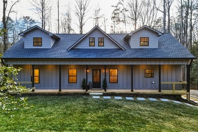 Tucked away in the serene North Georgia mountains, this on White Path Golf Club in Georgia - for sale on GolfHomes.com, golf home, golf lot