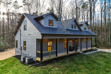 Tucked away in the serene North Georgia mountains, this on White Path Golf Club in Georgia - for sale on GolfHomes.com, golf home, golf lot