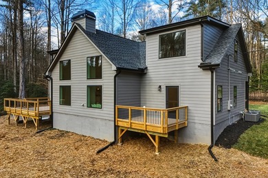 Tucked away in the serene North Georgia mountains, this on White Path Golf Club in Georgia - for sale on GolfHomes.com, golf home, golf lot