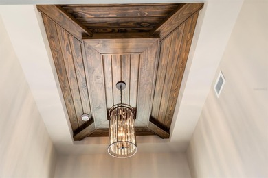 STUNNING SHOWSTOPPER! Custom-built by Harbor Home Builders, this on Saint Andrews South Golf Club in Florida - for sale on GolfHomes.com, golf home, golf lot