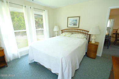 Nestled in Skimmer Cove on Blue Heron Lake, this home offers one on Ocean Point Golf Links in South Carolina - for sale on GolfHomes.com, golf home, golf lot