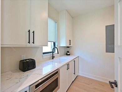 Experience elevated island living in this exceptional brand-new on Key Royale Club in Florida - for sale on GolfHomes.com, golf home, golf lot