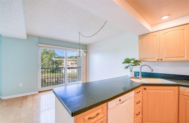 WELCOME TO THE FAIRWAY, a self-managed bldg. which keeps the HOA on East Bay Golf Club in Florida - for sale on GolfHomes.com, golf home, golf lot