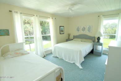 Nestled in Skimmer Cove on Blue Heron Lake, this home offers one on Ocean Point Golf Links in South Carolina - for sale on GolfHomes.com, golf home, golf lot