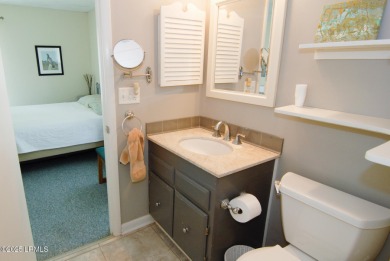 Nestled in Skimmer Cove on Blue Heron Lake, this home offers one on Ocean Point Golf Links in South Carolina - for sale on GolfHomes.com, golf home, golf lot
