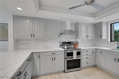 Welcome to a sanctuary where elegant upgrades meets serenity on The Landings Yacht, Golf and Tennis Club in Florida - for sale on GolfHomes.com, golf home, golf lot