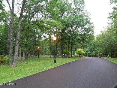 Beautiful level wooded lot in FAWN LAKE is available for the on Forest Lake Club in Pennsylvania - for sale on GolfHomes.com, golf home, golf lot