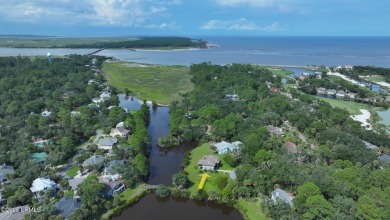 Nestled in Skimmer Cove on Blue Heron Lake, this home offers one on Ocean Point Golf Links in South Carolina - for sale on GolfHomes.com, golf home, golf lot