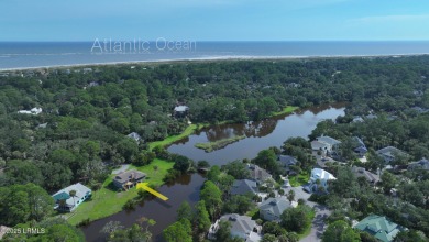 Nestled in Skimmer Cove on Blue Heron Lake, this home offers one on Ocean Point Golf Links in South Carolina - for sale on GolfHomes.com, golf home, golf lot