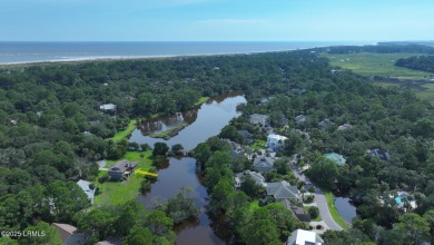 Nestled in Skimmer Cove on Blue Heron Lake, this home offers one on Ocean Point Golf Links in South Carolina - for sale on GolfHomes.com, golf home, golf lot