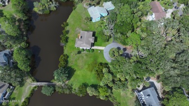 Nestled in Skimmer Cove on Blue Heron Lake, this home offers one on Ocean Point Golf Links in South Carolina - for sale on GolfHomes.com, golf home, golf lot