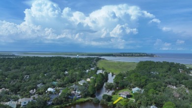 Nestled in Skimmer Cove on Blue Heron Lake, this home offers one on Ocean Point Golf Links in South Carolina - for sale on GolfHomes.com, golf home, golf lot