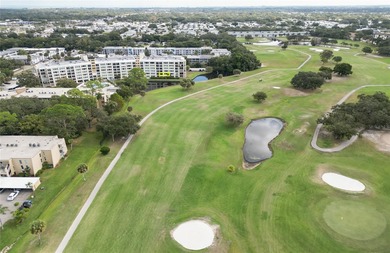 WELCOME TO THE FAIRWAY, a self-managed bldg. which keeps the HOA on East Bay Golf Club in Florida - for sale on GolfHomes.com, golf home, golf lot