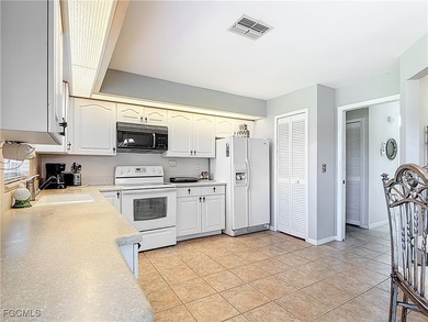 Imagine your favorite neighborhood bar just steps from your on Herons Glen Golf and Country Club in Florida - for sale on GolfHomes.com, golf home, golf lot