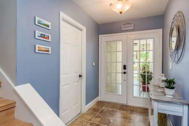 Discover the perfect blend of coastal charm and modern luxury in on The Dunedin Country Club in Florida - for sale on GolfHomes.com, golf home, golf lot