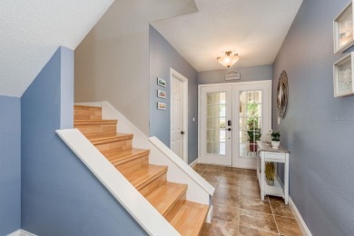 Discover the perfect blend of coastal charm and modern luxury in on The Dunedin Country Club in Florida - for sale on GolfHomes.com, golf home, golf lot