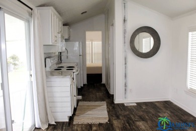 This super fun 1BR/1BA tiny home packs a lot of punch! This home on Lily Lake Golf and RV Resort in Florida - for sale on GolfHomes.com, golf home, golf lot