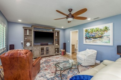 Discover the perfect blend of coastal charm and modern luxury in on The Dunedin Country Club in Florida - for sale on GolfHomes.com, golf home, golf lot