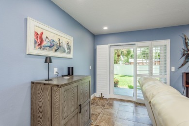 Discover the perfect blend of coastal charm and modern luxury in on The Dunedin Country Club in Florida - for sale on GolfHomes.com, golf home, golf lot