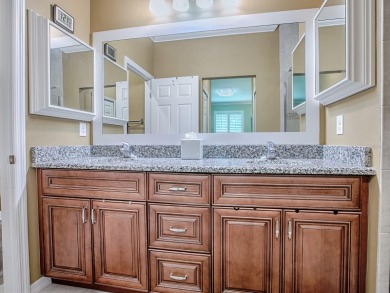 Enjoy maintenance-free living in this spacious 2-bedroom, 2-bath on Arlington Ridge Golf Club in Florida - for sale on GolfHomes.com, golf home, golf lot