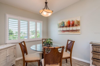 Discover the perfect blend of coastal charm and modern luxury in on The Dunedin Country Club in Florida - for sale on GolfHomes.com, golf home, golf lot