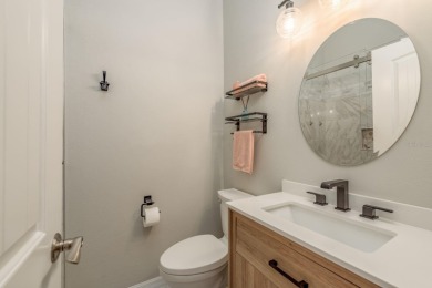 Discover the perfect blend of coastal charm and modern luxury in on The Dunedin Country Club in Florida - for sale on GolfHomes.com, golf home, golf lot