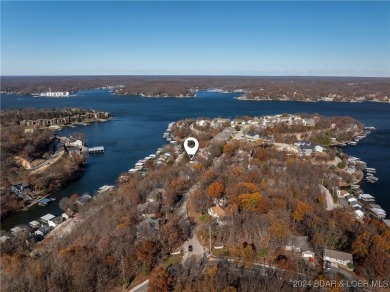 Located off HH in Lake Ozark, this meticulously maintained on Seasons Ridge At Four Seasons in Missouri - for sale on GolfHomes.com, golf home, golf lot