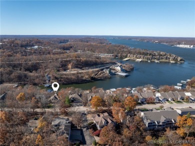 Located off HH in Lake Ozark, this meticulously maintained on Seasons Ridge At Four Seasons in Missouri - for sale on GolfHomes.com, golf home, golf lot