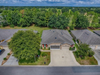 Enjoy maintenance-free living in this spacious 2-bedroom, 2-bath on Arlington Ridge Golf Club in Florida - for sale on GolfHomes.com, golf home, golf lot