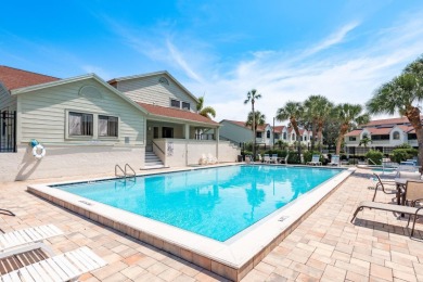 Discover the perfect blend of coastal charm and modern luxury in on The Dunedin Country Club in Florida - for sale on GolfHomes.com, golf home, golf lot
