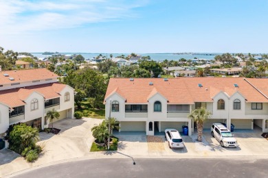 Discover the perfect blend of coastal charm and modern luxury in on The Dunedin Country Club in Florida - for sale on GolfHomes.com, golf home, golf lot