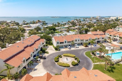 Discover the perfect blend of coastal charm and modern luxury in on The Dunedin Country Club in Florida - for sale on GolfHomes.com, golf home, golf lot