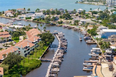 Discover the perfect blend of coastal charm and modern luxury in on The Dunedin Country Club in Florida - for sale on GolfHomes.com, golf home, golf lot