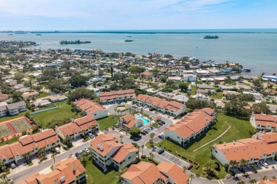 Discover the perfect blend of coastal charm and modern luxury in on The Dunedin Country Club in Florida - for sale on GolfHomes.com, golf home, golf lot