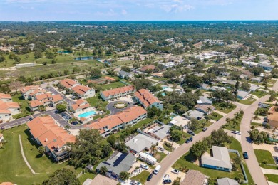 Discover the perfect blend of coastal charm and modern luxury in on The Dunedin Country Club in Florida - for sale on GolfHomes.com, golf home, golf lot