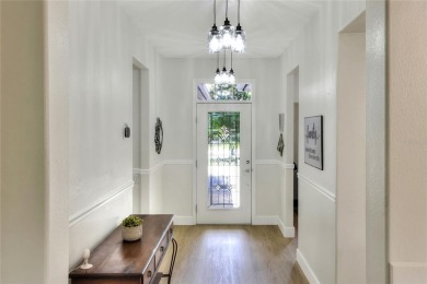 Located in the desirable RESORT-STYLE 55+ community of DEL WEBB on Ridgewood Lakes Golf and Country Club in Florida - for sale on GolfHomes.com, golf home, golf lot