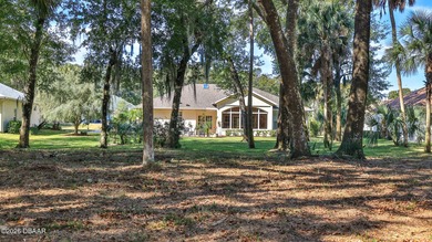 GORGEOUS GOLF COURSE HOME SITTING ON THE 6TH FAIRWAY IN HIGHLY on Halifax Plantation Golf Club in Florida - for sale on GolfHomes.com, golf home, golf lot
