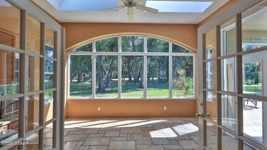 GORGEOUS GOLF COURSE HOME SITTING ON THE 6TH FAIRWAY IN HIGHLY on Halifax Plantation Golf Club in Florida - for sale on GolfHomes.com, golf home, golf lot