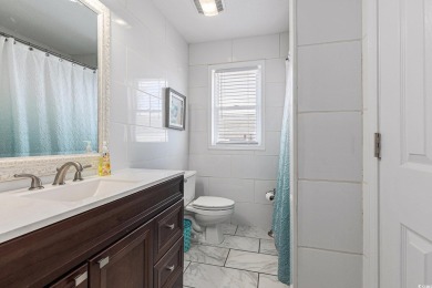 Unique 2 story ground level fully furnished beach home on Prestwick Country Club in South Carolina - for sale on GolfHomes.com, golf home, golf lot