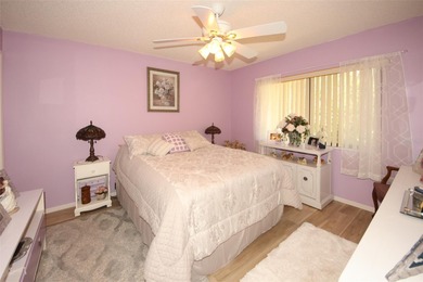 Immaculate second floor end unit in the beautiful Eagleswood on Beacon Woods Golf Club in Florida - for sale on GolfHomes.com, golf home, golf lot