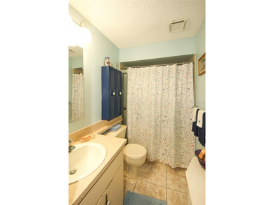 Immaculate second floor end unit in the beautiful Eagleswood on Beacon Woods Golf Club in Florida - for sale on GolfHomes.com, golf home, golf lot