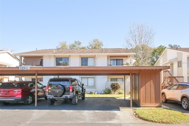 Immaculate second floor end unit in the beautiful Eagleswood on Beacon Woods Golf Club in Florida - for sale on GolfHomes.com, golf home, golf lot
