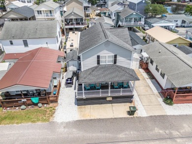 Unique 2 story ground level fully furnished beach home on Prestwick Country Club in South Carolina - for sale on GolfHomes.com, golf home, golf lot