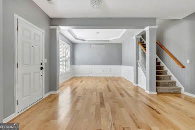 Luxury Golf Course Living with a Fully Finished In-Law Suite on Summergrove Golf Club in Georgia - for sale on GolfHomes.com, golf home, golf lot
