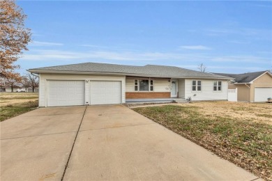 Discover the perfect blend of comfort and convenience in this on Ottawa Country Club in Kansas - for sale on GolfHomes.com, golf home, golf lot