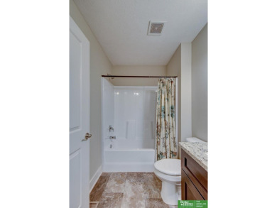 Ryan Renner, M: , ryan.renner,   - This low-maintenance townhome on Bay Hills Golf Club in Nebraska - for sale on GolfHomes.com, golf home, golf lot
