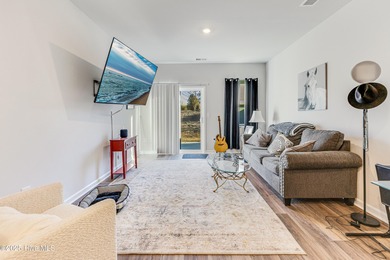 This Blakely Townhome plan is a two story - end unit with a 1 on Brunswick Plantation and Golf Resorts in North Carolina - for sale on GolfHomes.com, golf home, golf lot