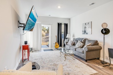 This Blakely Townhome plan is a two story - end unit with a 1 on Brunswick Plantation and Golf Resorts in North Carolina - for sale on GolfHomes.com, golf home, golf lot