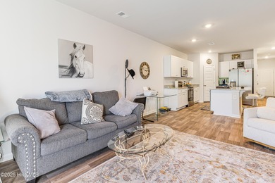 This Blakely Townhome plan is a two story - end unit with a 1 on Brunswick Plantation and Golf Resorts in North Carolina - for sale on GolfHomes.com, golf home, golf lot