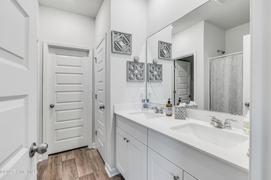 This Blakely Townhome plan is a two story - end unit with a 1 on Brunswick Plantation and Golf Resorts in North Carolina - for sale on GolfHomes.com, golf home, golf lot